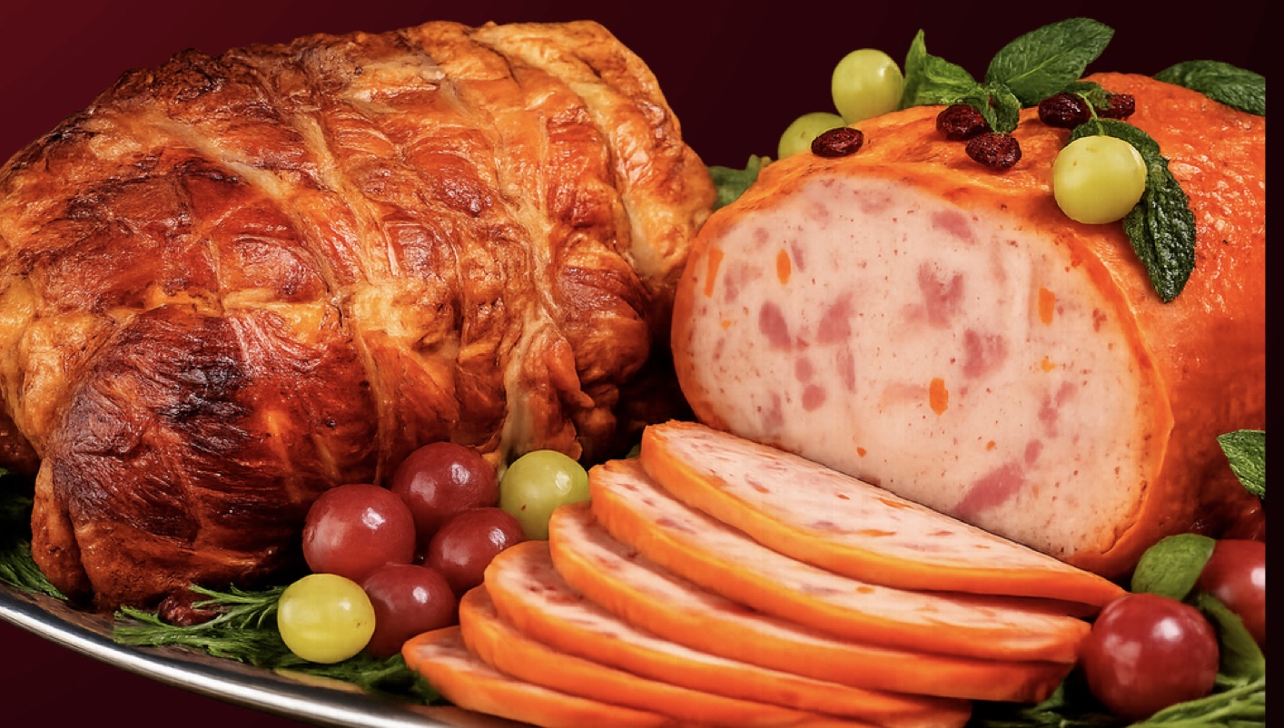 Pavo relleno horneado y jamón en rodajas